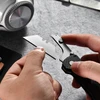 Olight U1 Proユーティリティナイフのクローズアップ、交換可能なブレードで日常のタスクに最適