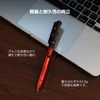 Olight Open 3 レッド＆ブラックのアルミ合金製ボールペンライト、パソコンの横に置かれた軽量で頑丈な15.6cmのペン型ライト、ビジネスや持ち運びに最適
